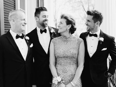 Darla Leigh Pittman Rodgers is looking at Luke Rodgers while he, Jordan and Edward Wesley Rodgers are in a tuxedo.